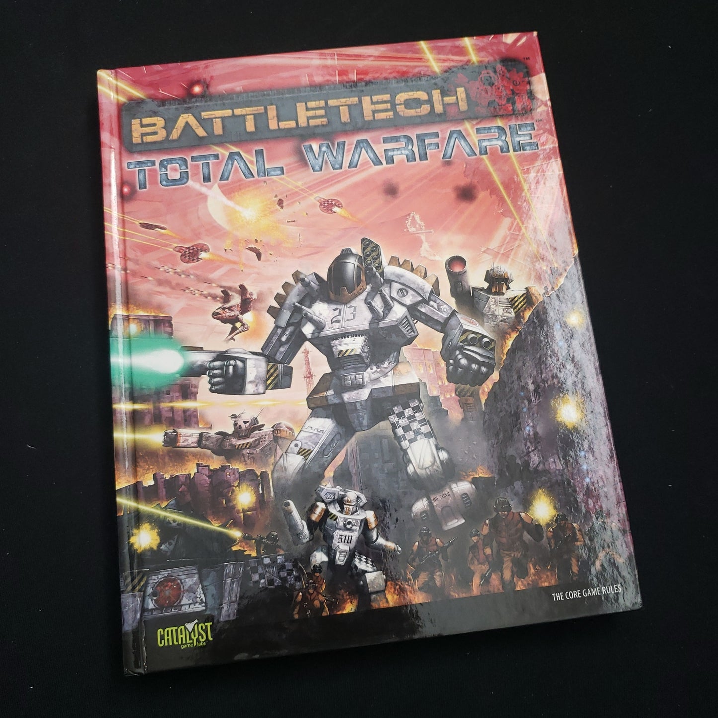 Image shows the front cover of the Total Warfare Core Rulebook for the Battletech miniatures game book