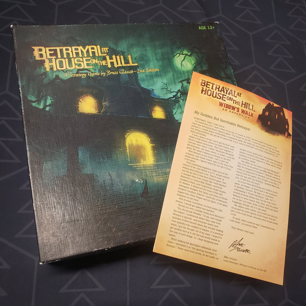 Image shows the front cover of the box of the Betrayal at House on the Hill board game