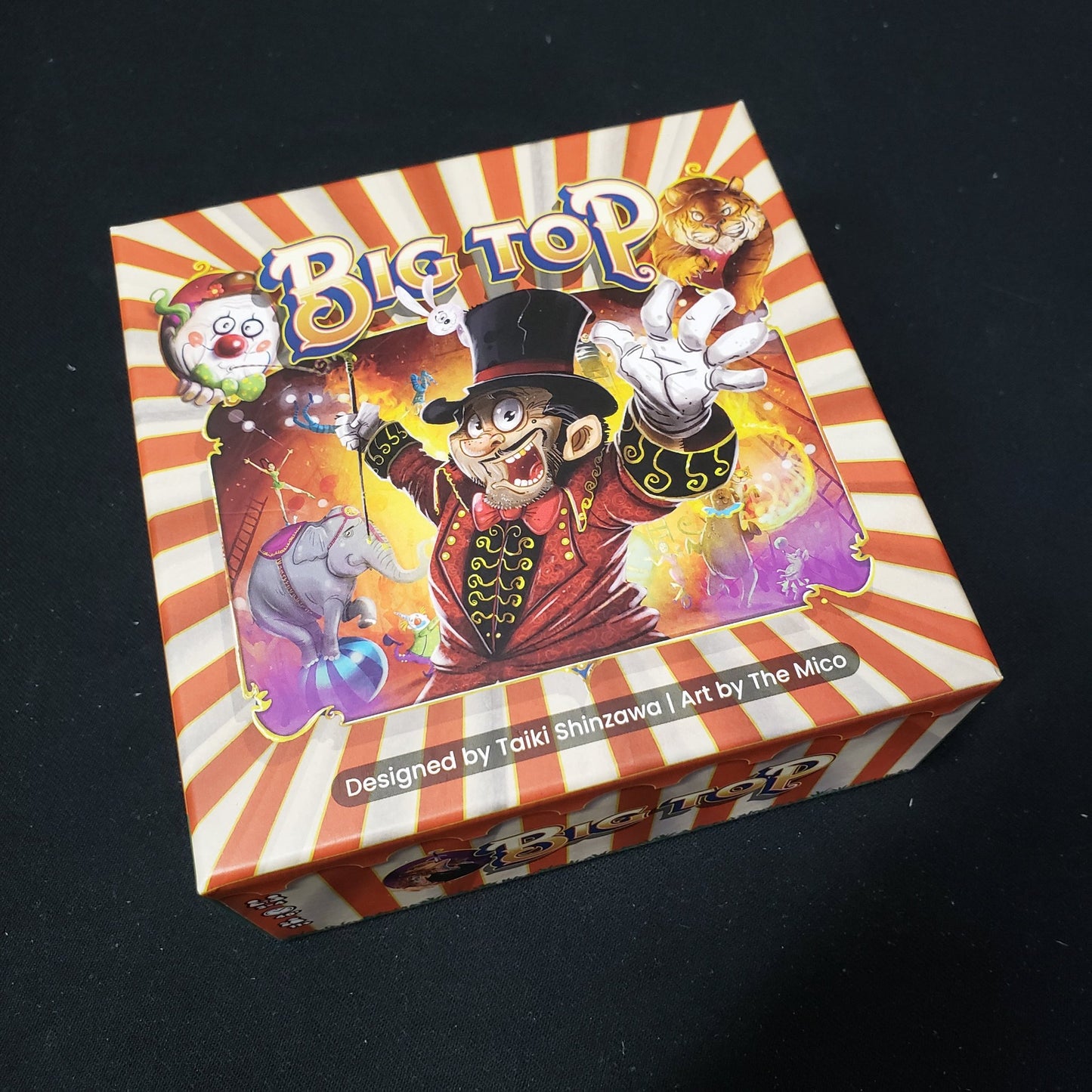 Image shows the front cover of the box of the Big Top board game