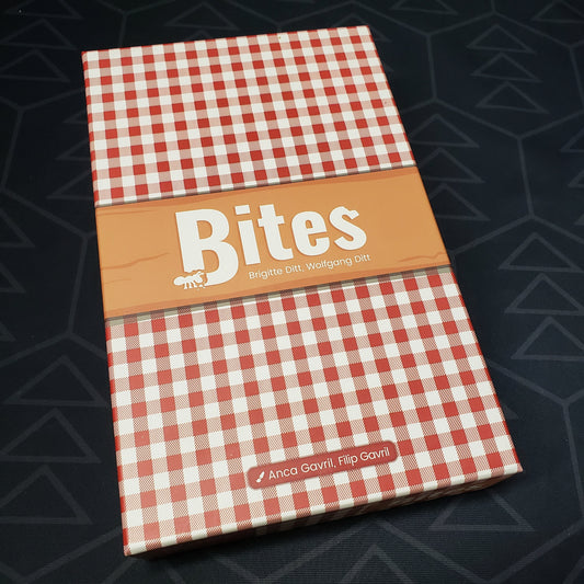 Image shows the front cover of the box for the Bites board game