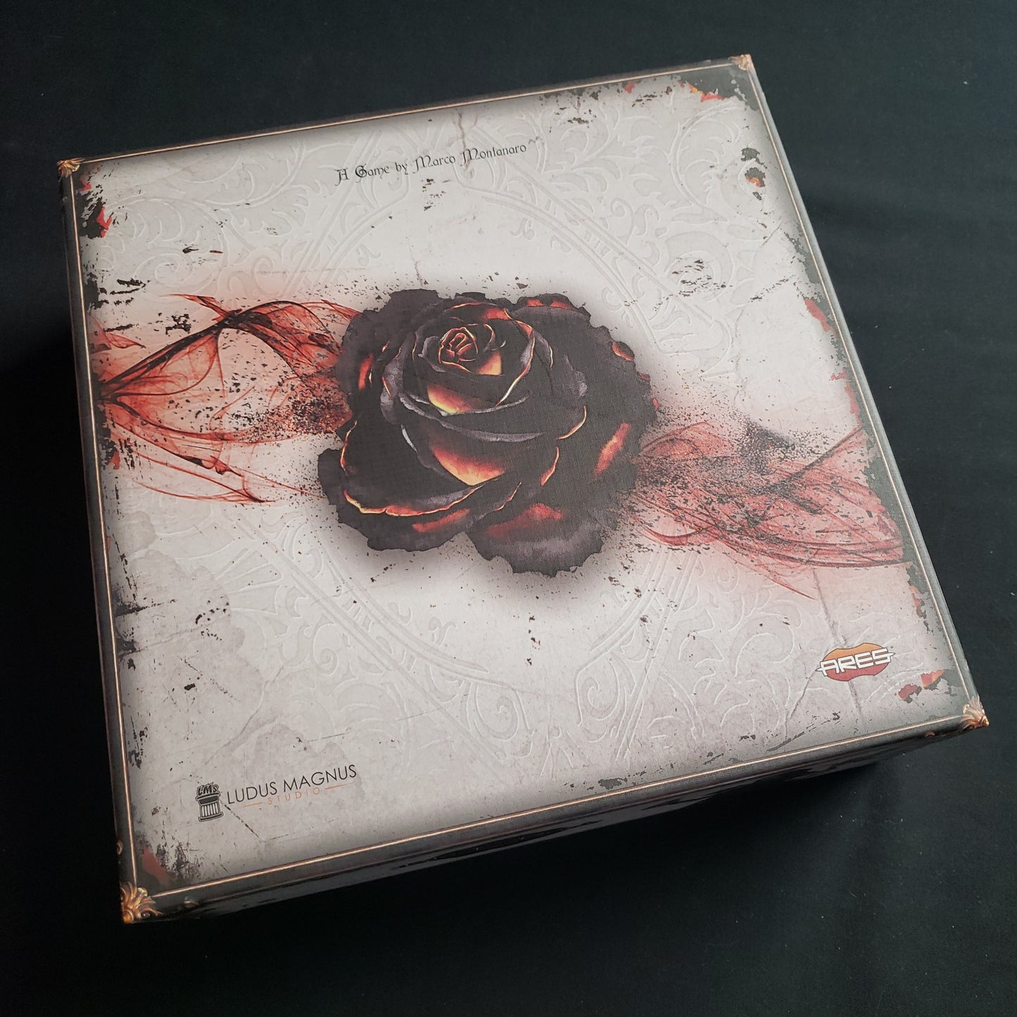 Image shows the front cover of the box of the Black Rose Wars board game