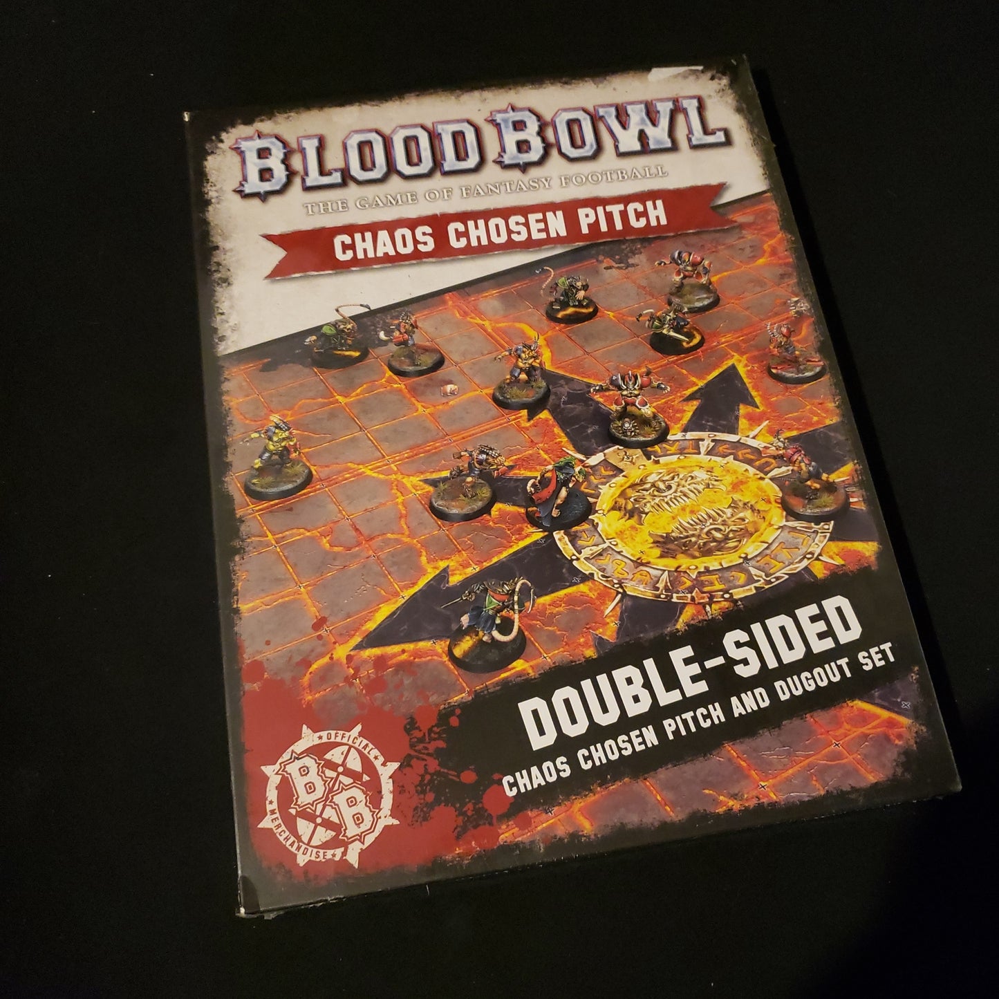 Image shows the front of the package for the Chaos Chosen Pitch & Dugout Pack for the Blood Bowl miniatures game