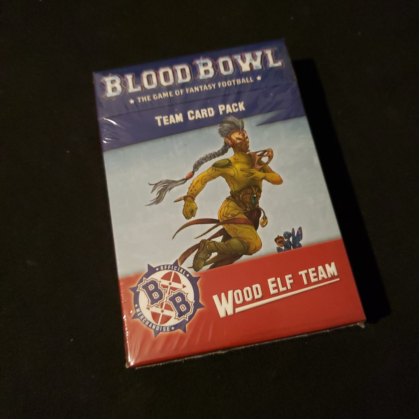 Image shows the front of the box for the Wood Elf Team Card Pack for the Blood Bowl miniatures game