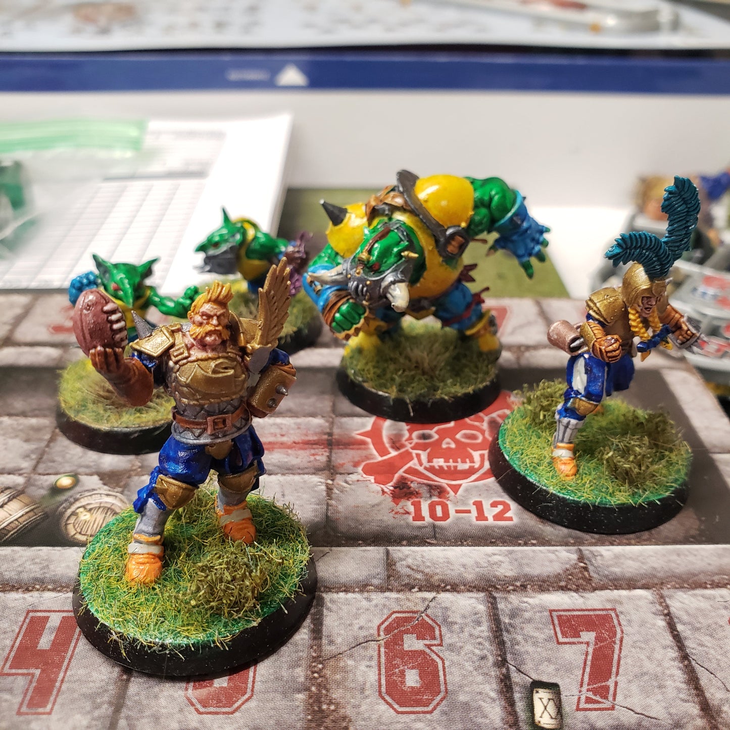 Image shows five painted miniatures from the Blood Bowl: Second Season Edition Core Set