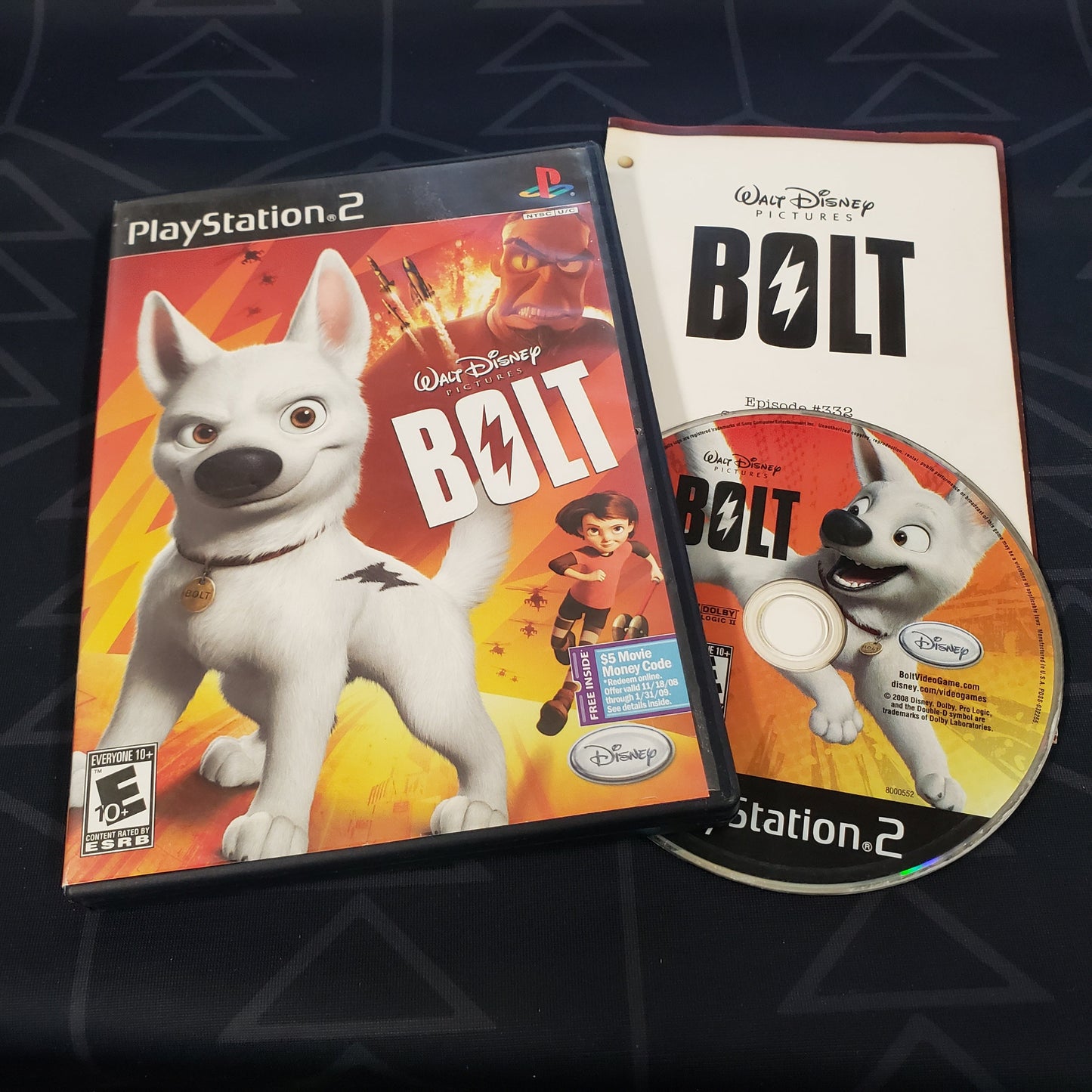 Image shows the case, manual and disc for the video game Bolt for Playstation 2