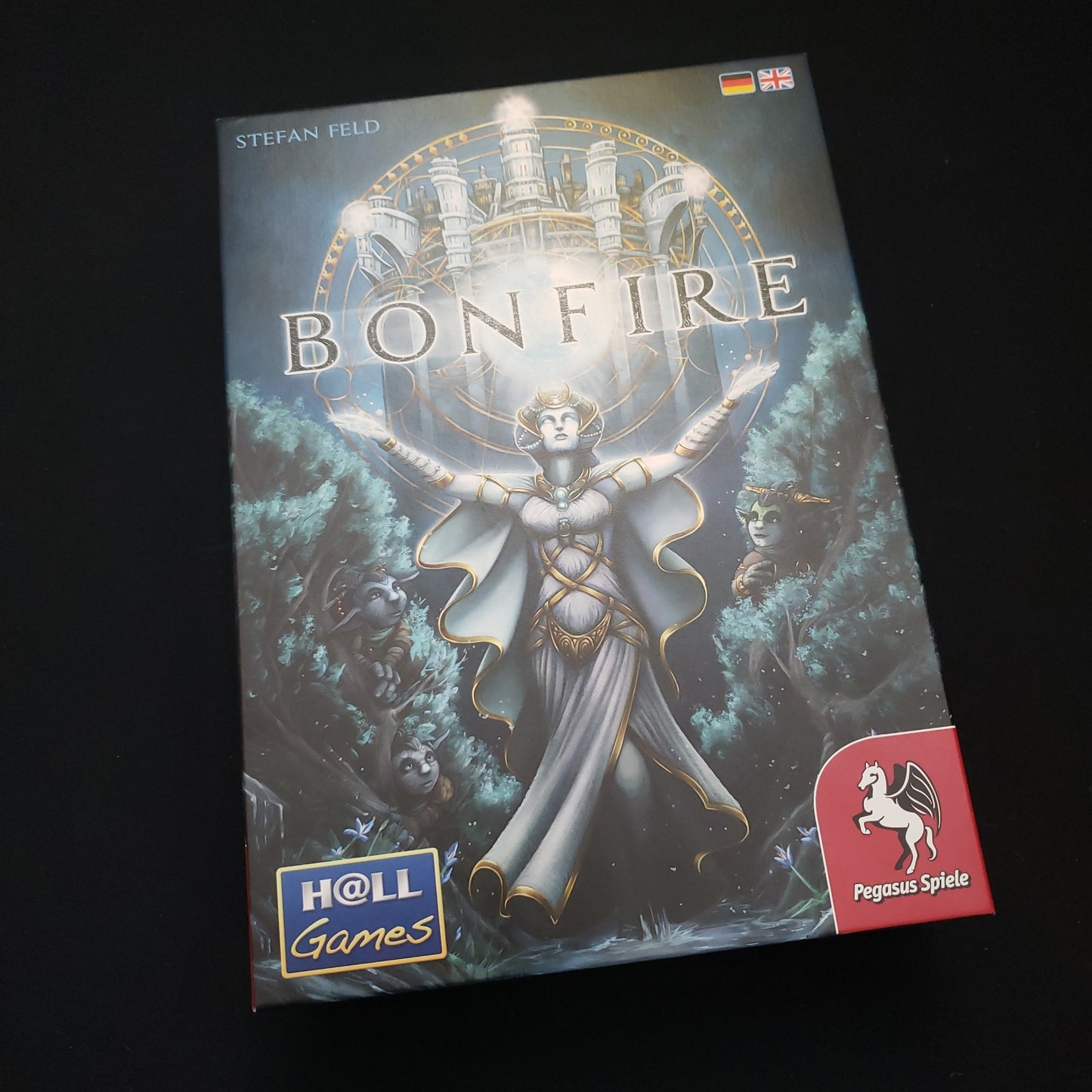 Image shows the front cover of the box of the Bonfire board game