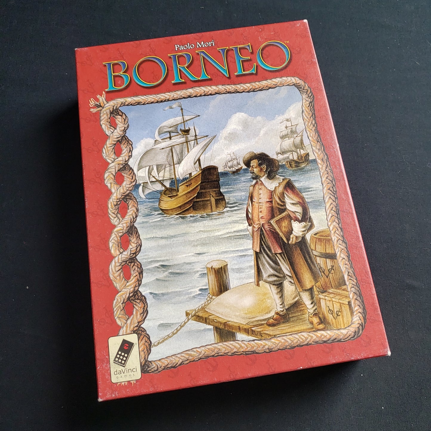 Image shows the front cover of the box of the Borneo board game