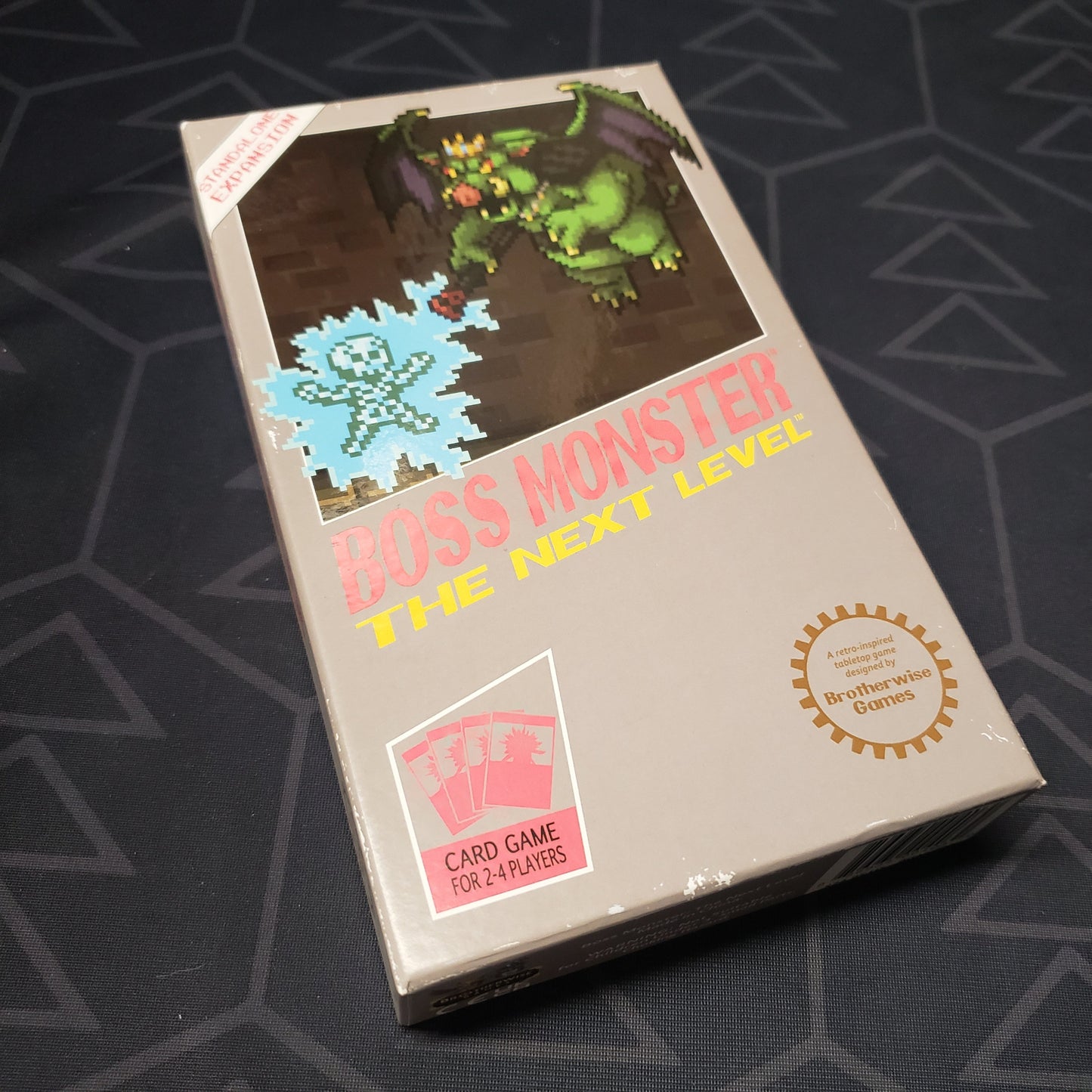 Image shows the front cover of the box for the Boss Monster 2: The Next Level card game