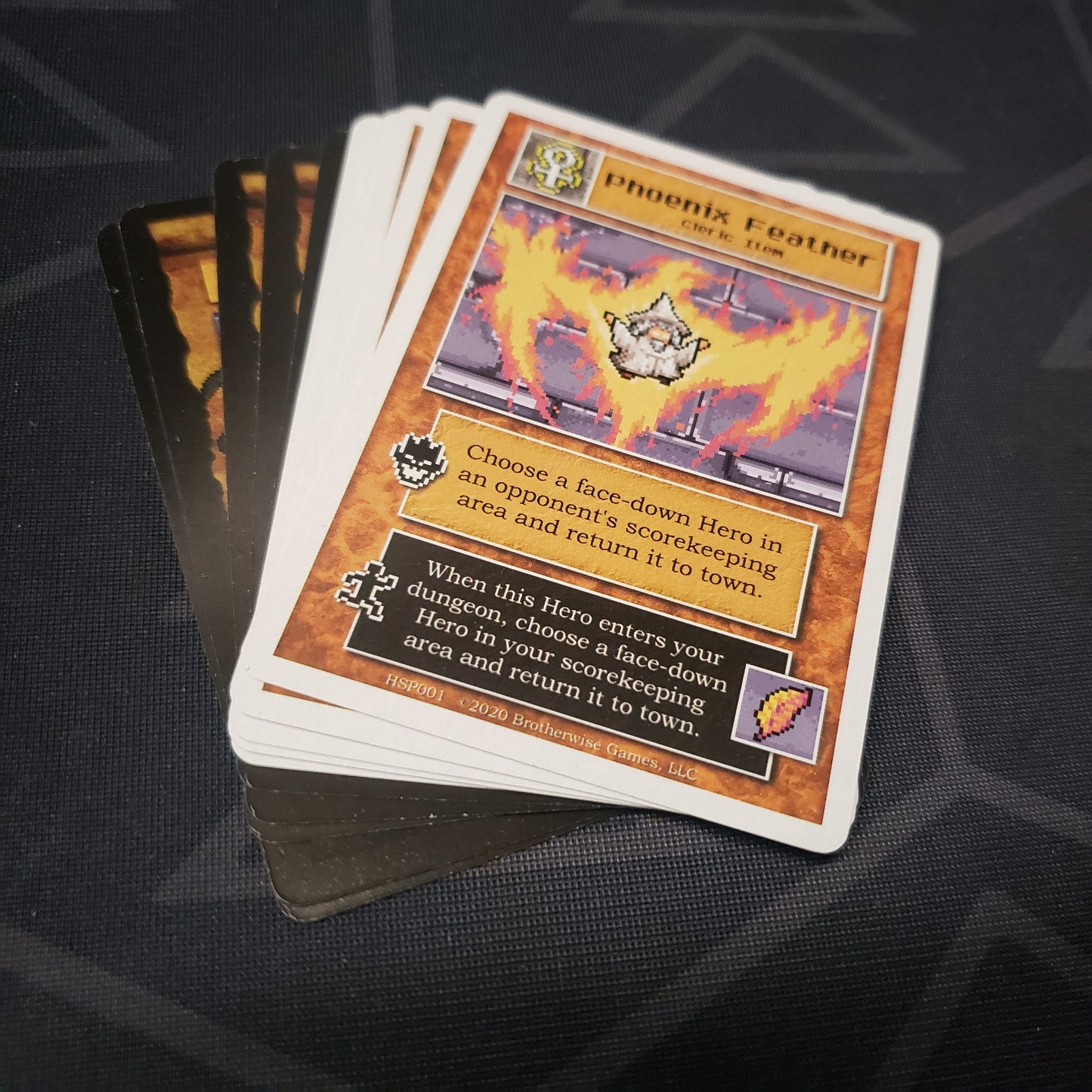 Image shows the fanned-out cards for the Hidden Secrets expansion pack for the card game Boss Monster