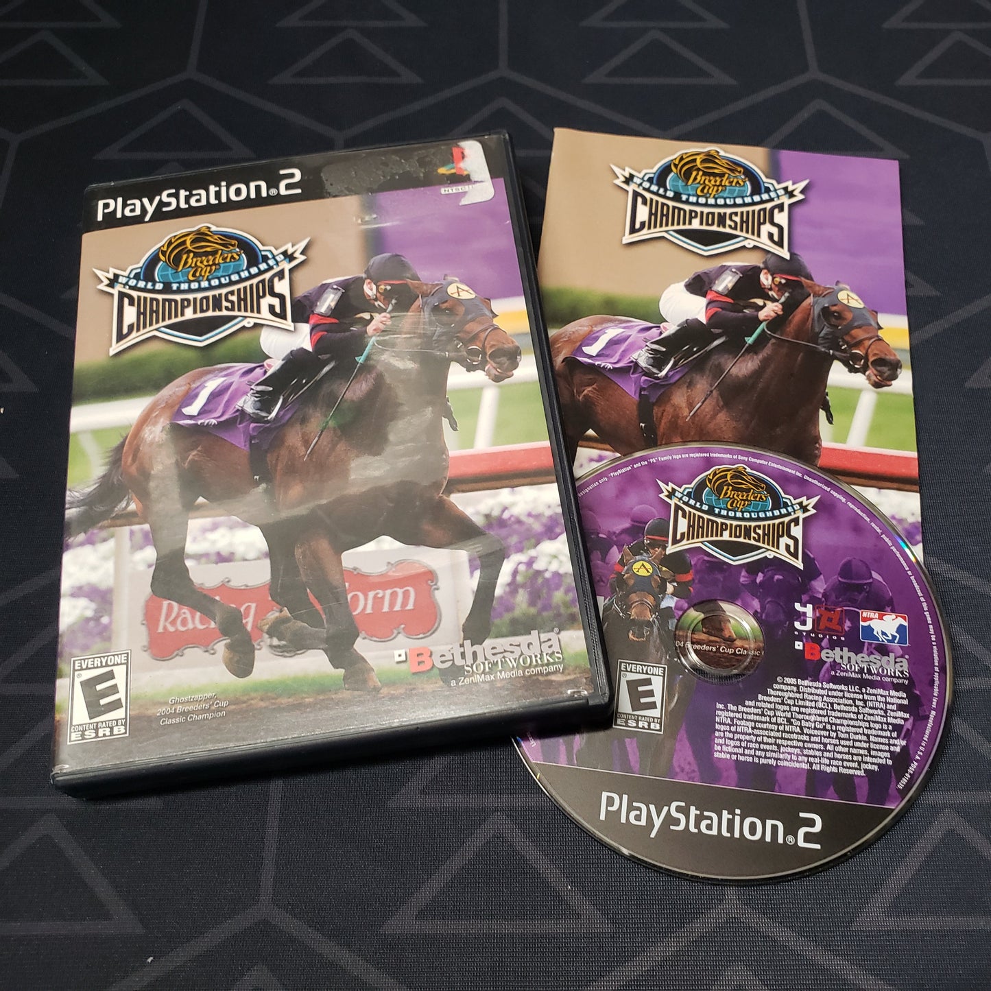 Image shows the case, manual & disc for the video game Breeders' Cup World Thoroughbred Championships for Playstation 2