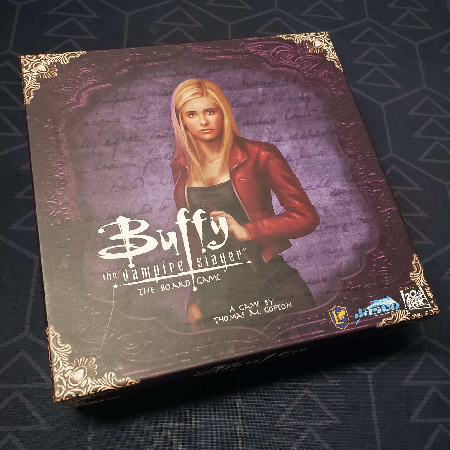 Image shows the front cover of the box for the 2016 Buffy the Vampire Slayer board game