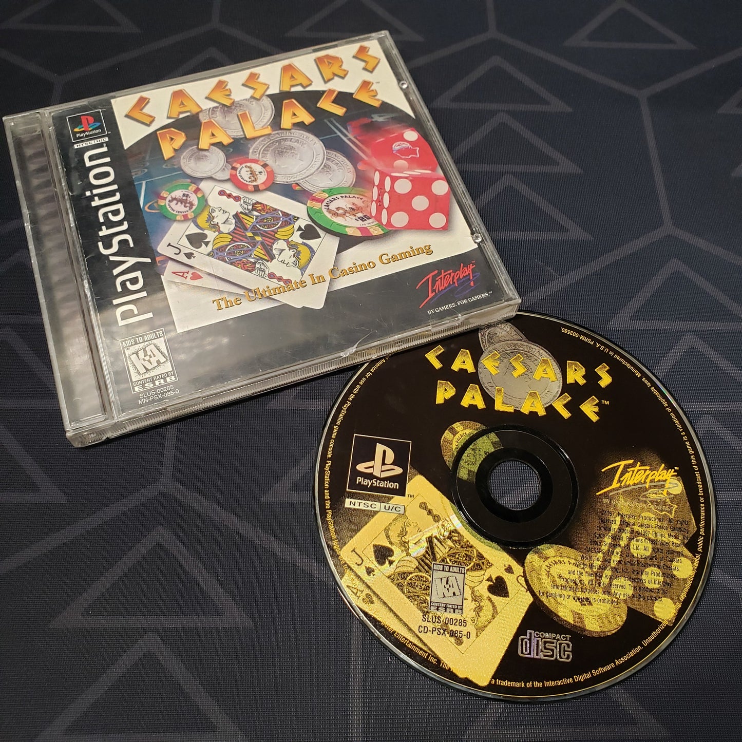 Image shows the jewel case with manual and disc for the video game Caesar's Palace for Playstation 1