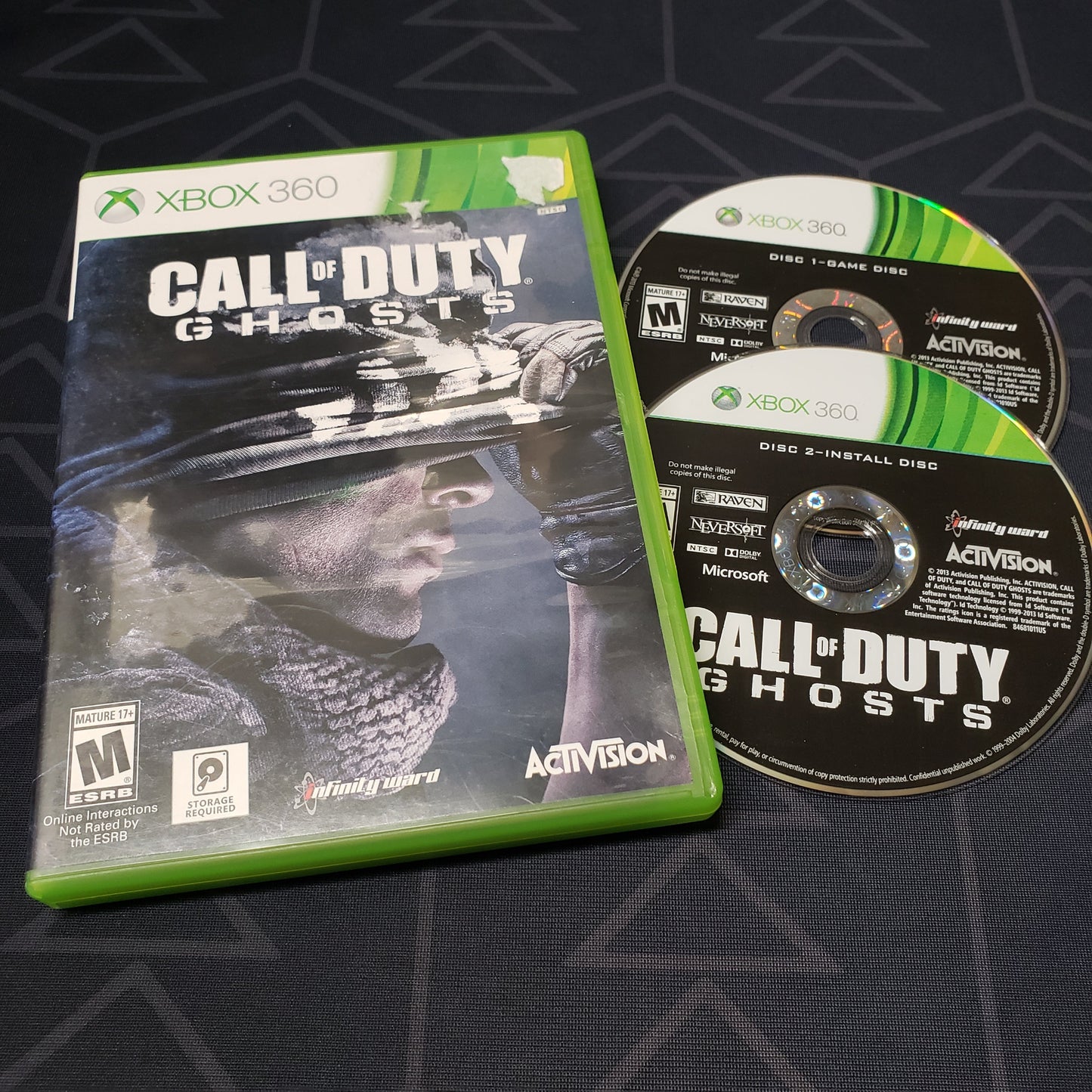 Image shows the case & two discs for the video game Call of Duty: Ghosts for Xbox 360