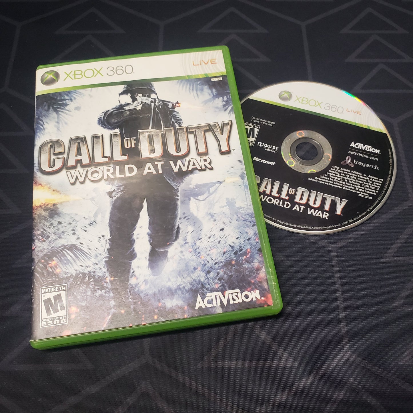 Image shows the case and disc for the video game Call of Duty: World At War for Xbox 360