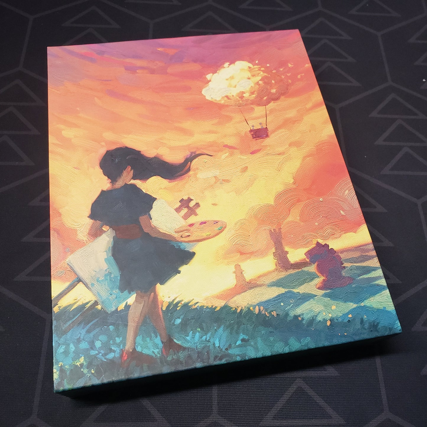 Image shows the front cover of the box of the Canvas board game