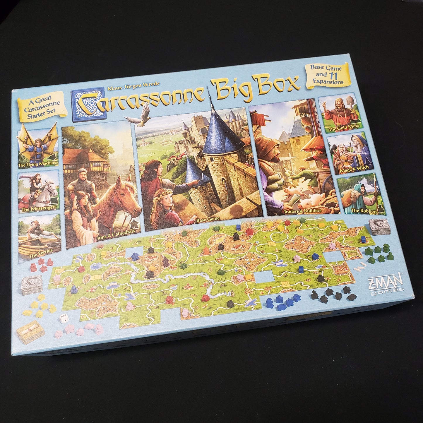 Image shows the front cover of the 2017 Sixth Edition Big Box for the board game Carcassonne