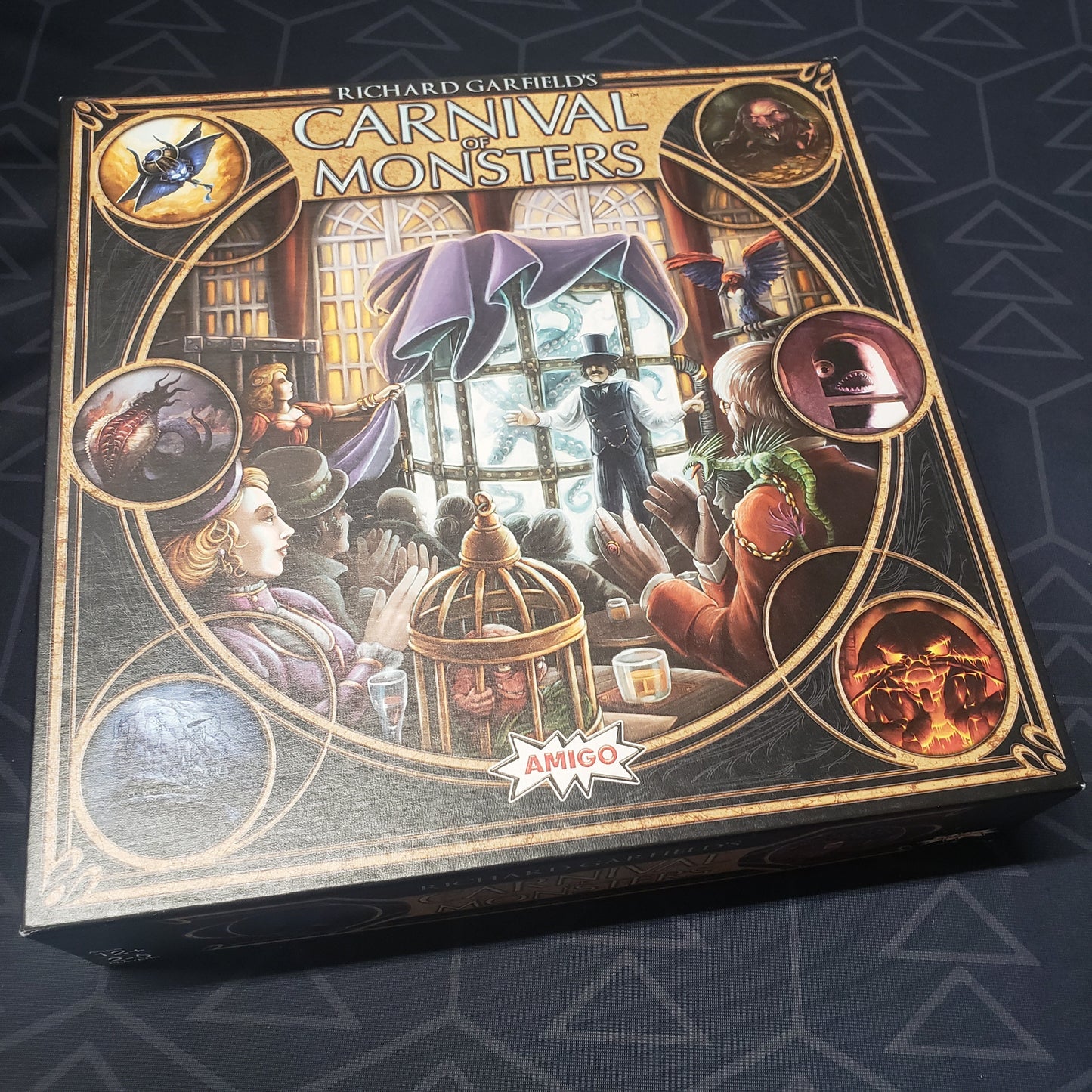Image shows the front cover of the box of the Carnival of Monsters board game