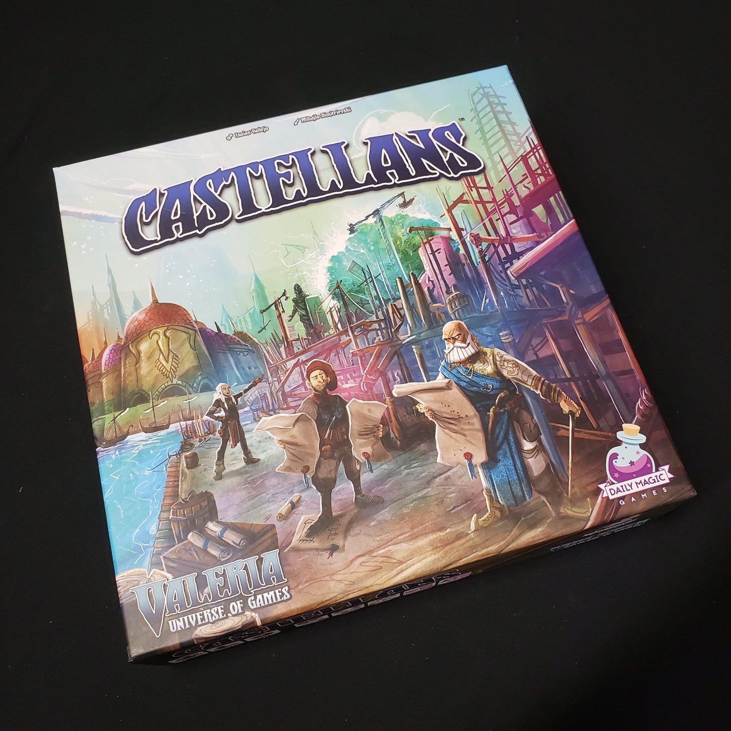 Image shows the front cover of the box of the Castellans board game