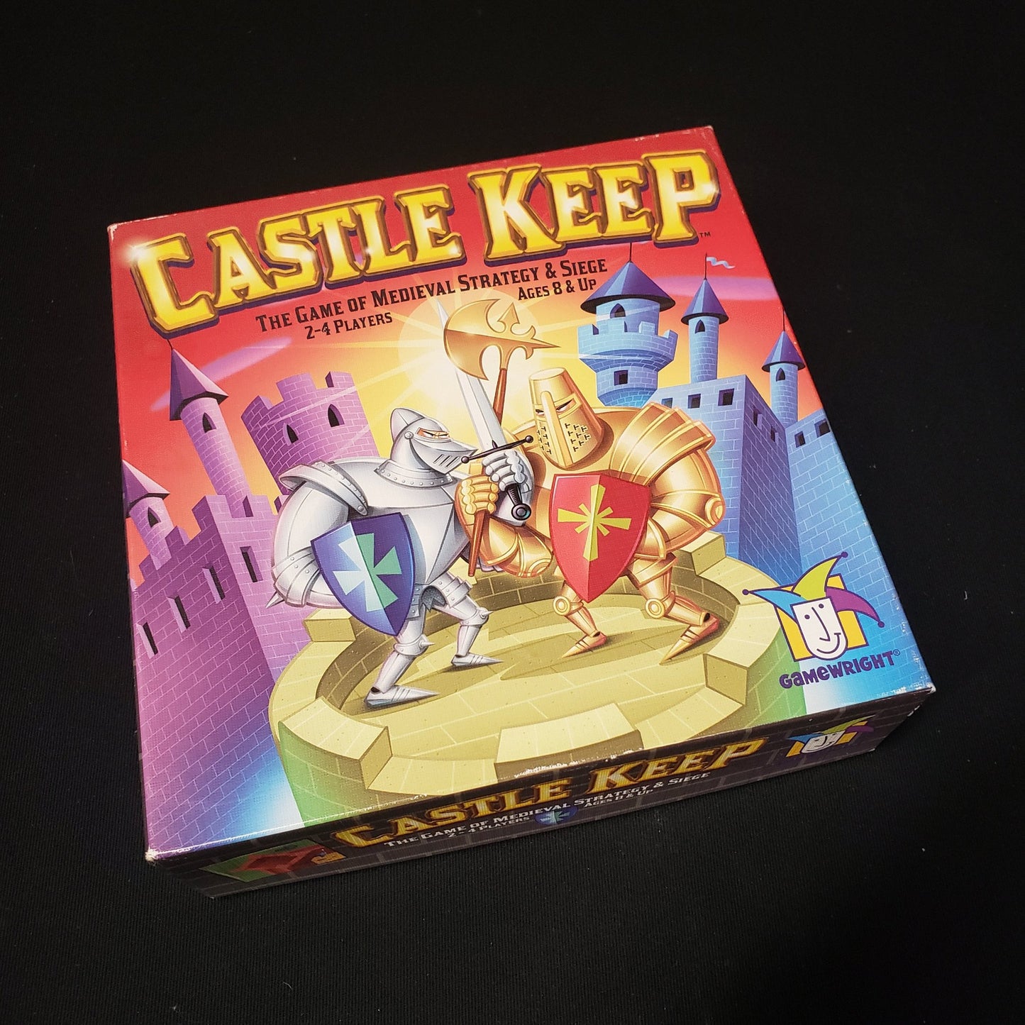 Image shows the front cover of the box of the Castle Keep board game