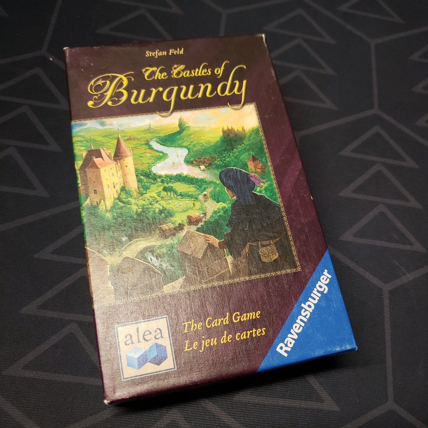 Image shows the front cover of the box for The Castles of Burgundy: The Card Game