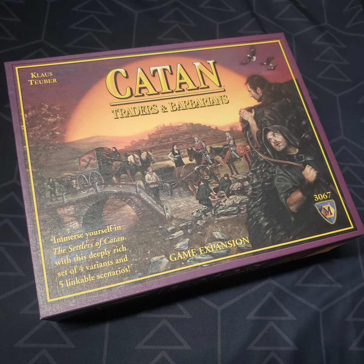 Image shows the front of the box for the Traders & Barbarians expansion for the board game Catan