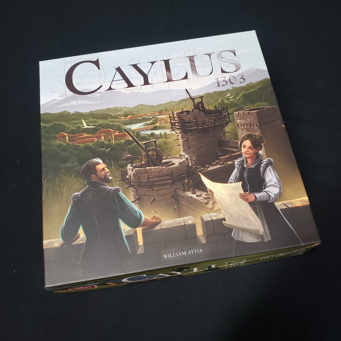 Image shows the front cover of the box of the Caylus 1303 board game