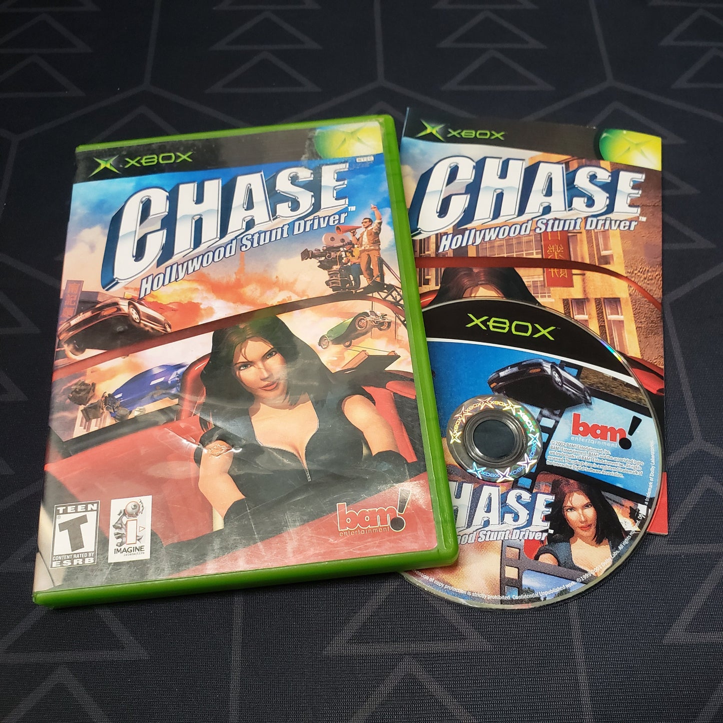 Image shows the case, manual & disc for the video game Chase: Hollywood Stunt Driver for Xbox