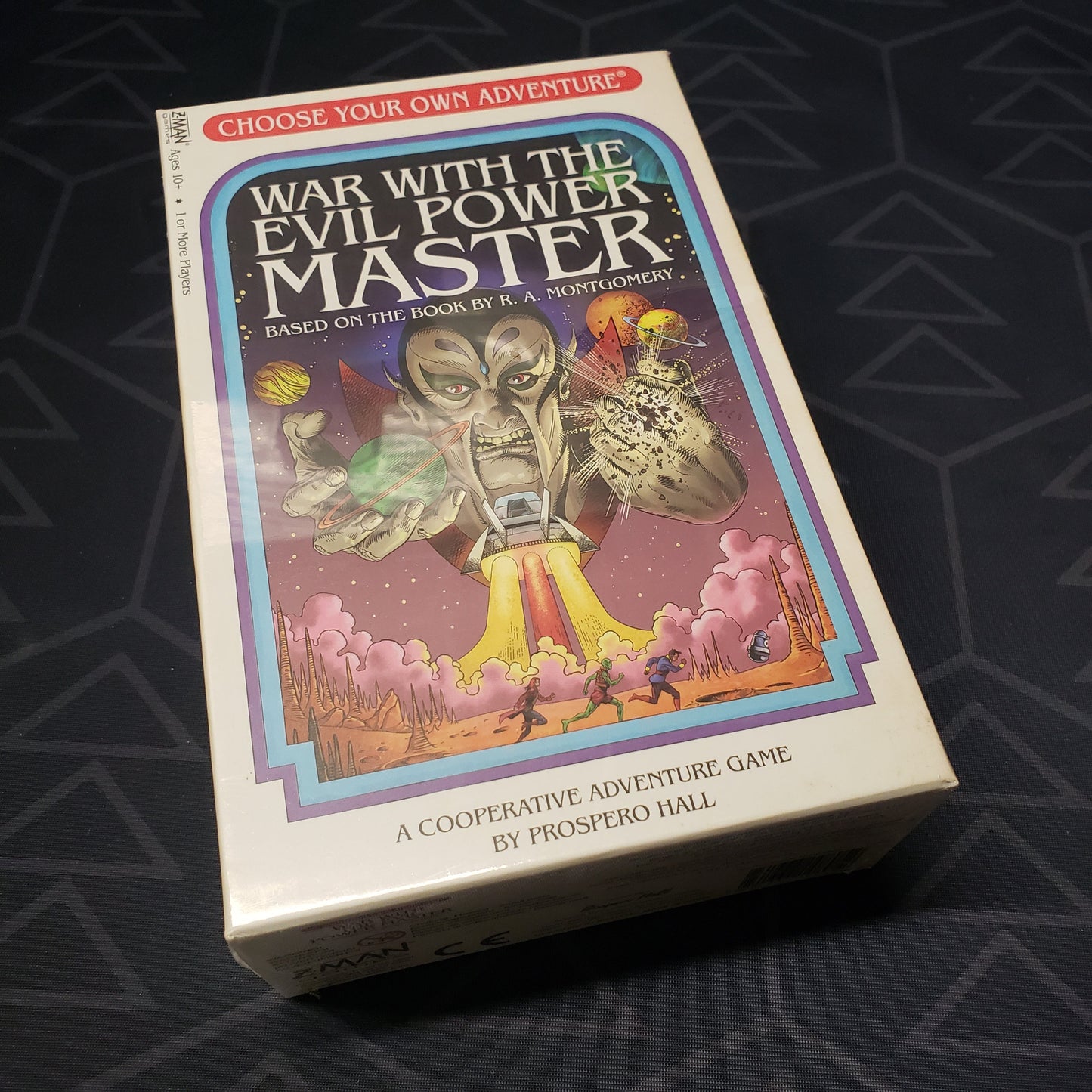 Image shows the front cover of the box for the Choose Your Own Adventure: War With the Evil Power Master card game