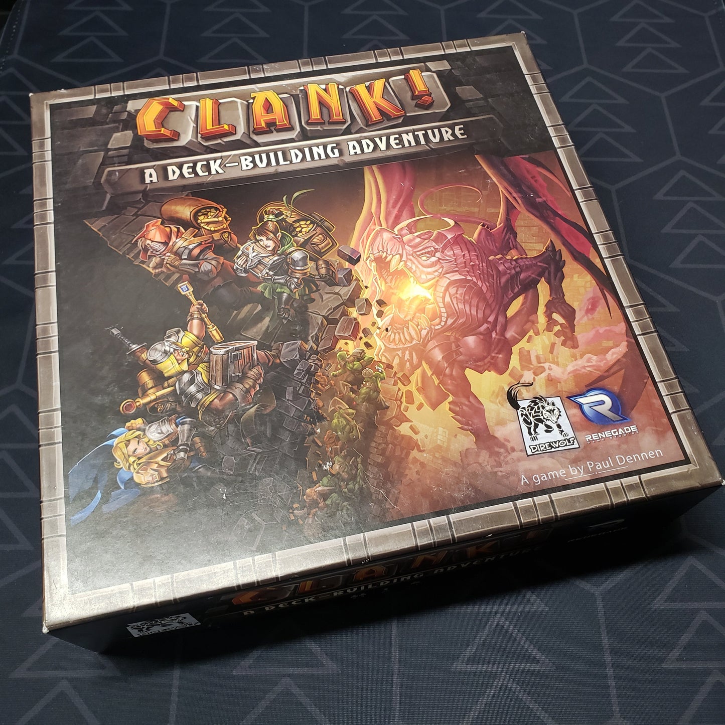 Image shows the front cover of the box of the Clank! board game