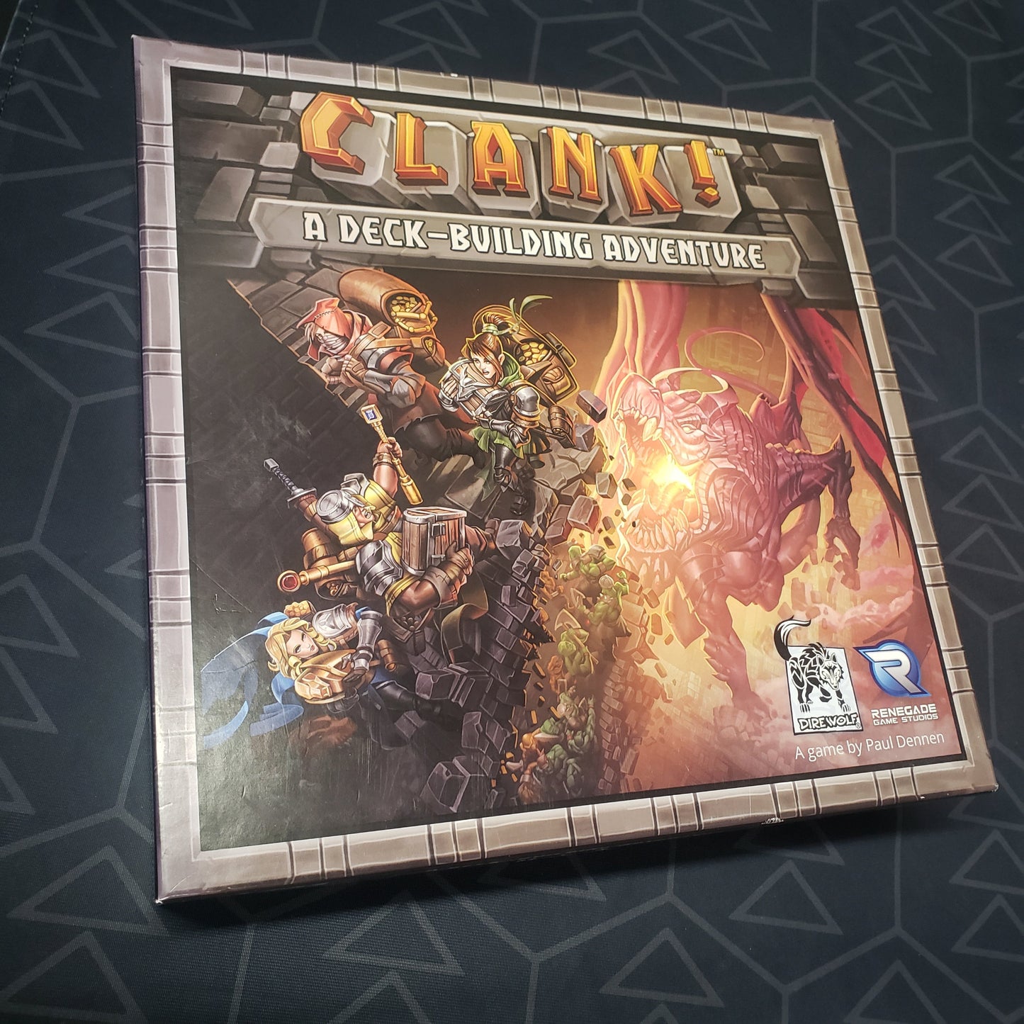 Image shows the front cover of the box of the Clank! board game