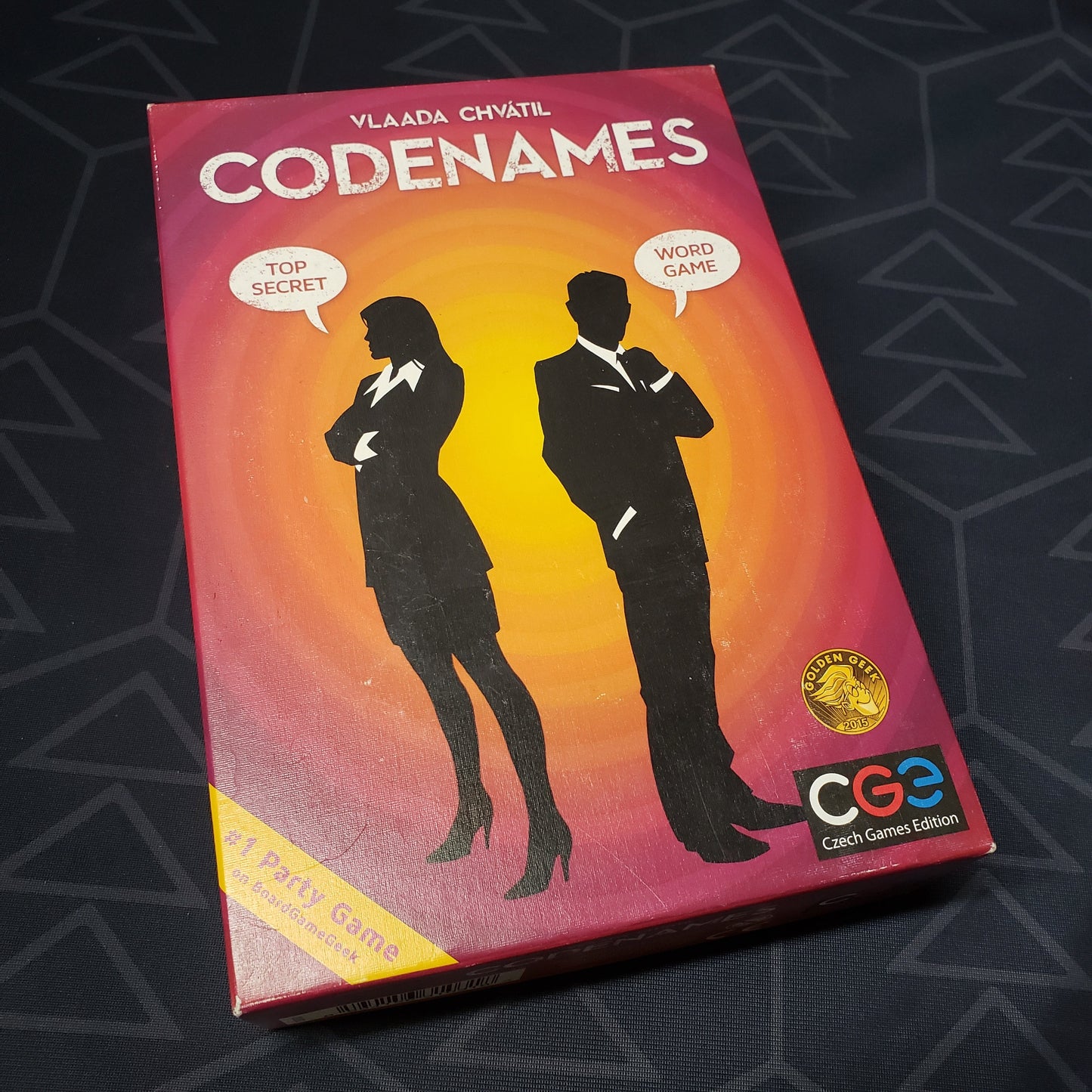 Image shows the front cover of the box for the Codenames board game