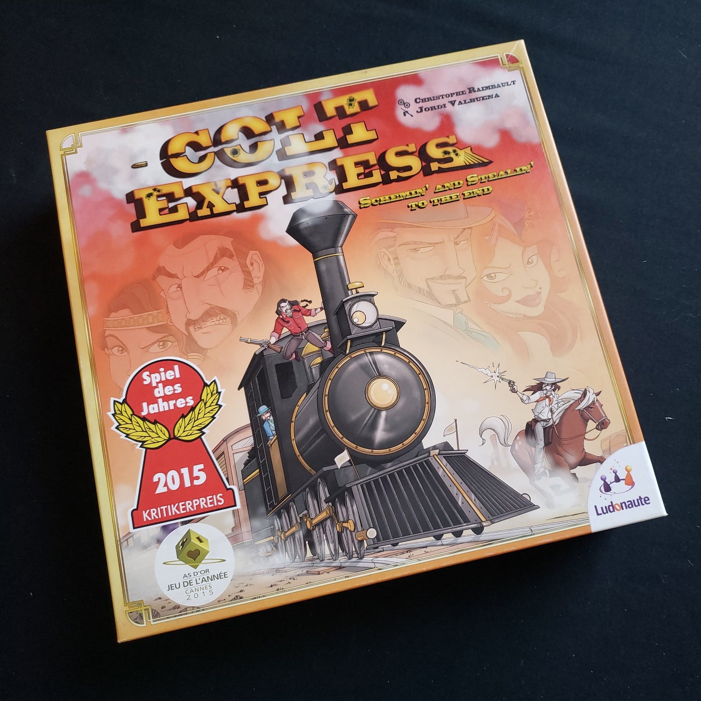 Image shows the front cover of the box of the Colt Express board game