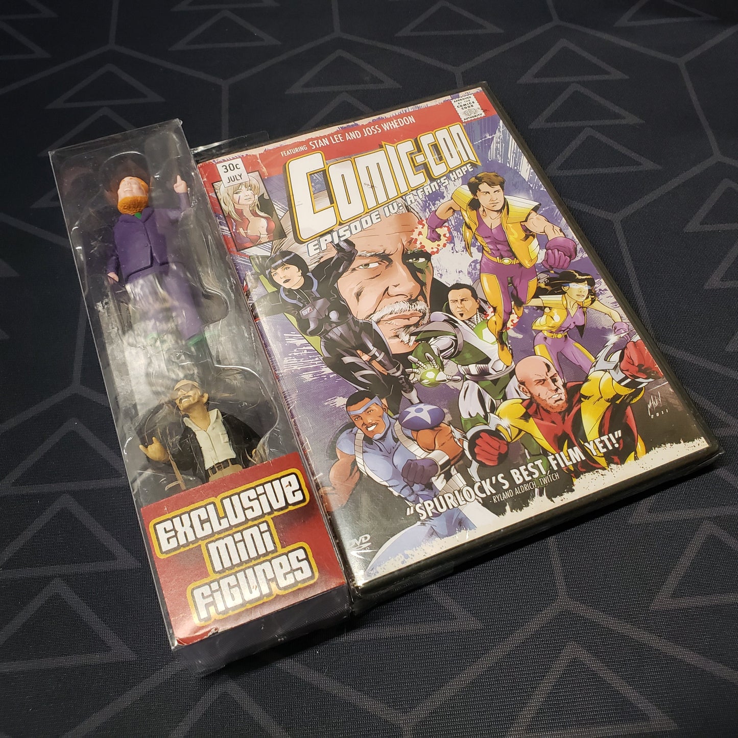 Image shows the front of the case & mini figure pack for the movie Comic-Con: Episode IV - A Fan's Hope on DVD