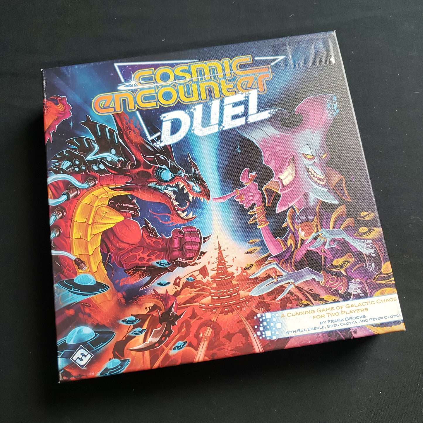 Image shows the front cover of the box of the Cosmic Encounter Duel board game