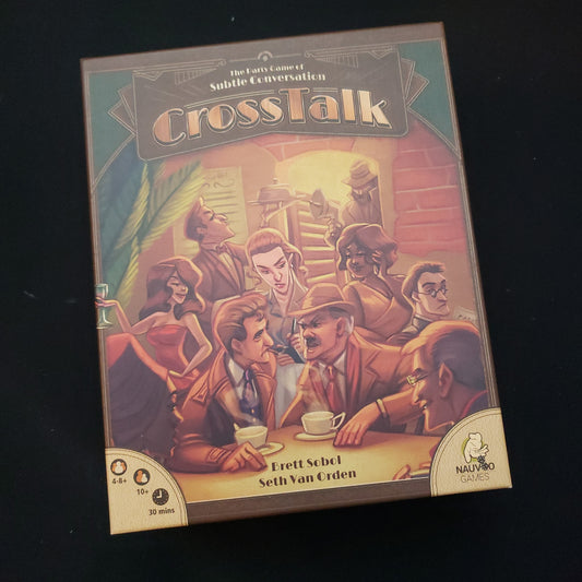 Image shows the front cover of the box of the CrossTalk board game