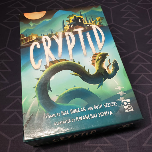 Image shows the front cover of the box of the Cryptid board game
