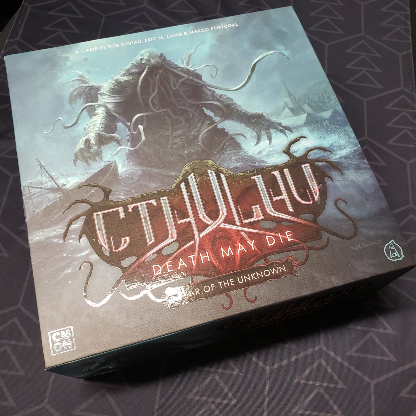Image shows the front cover of the box of the board game Cthulhu: Death May Die - Fear of the Unknown