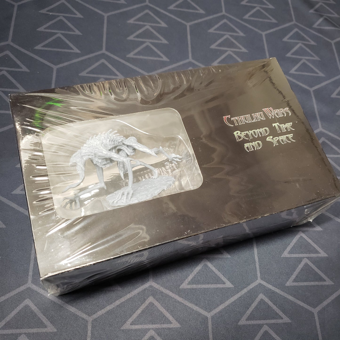 Image shows the front cover of the box of the Beyond Time and Space expansion for the Cthulhu Wars board game