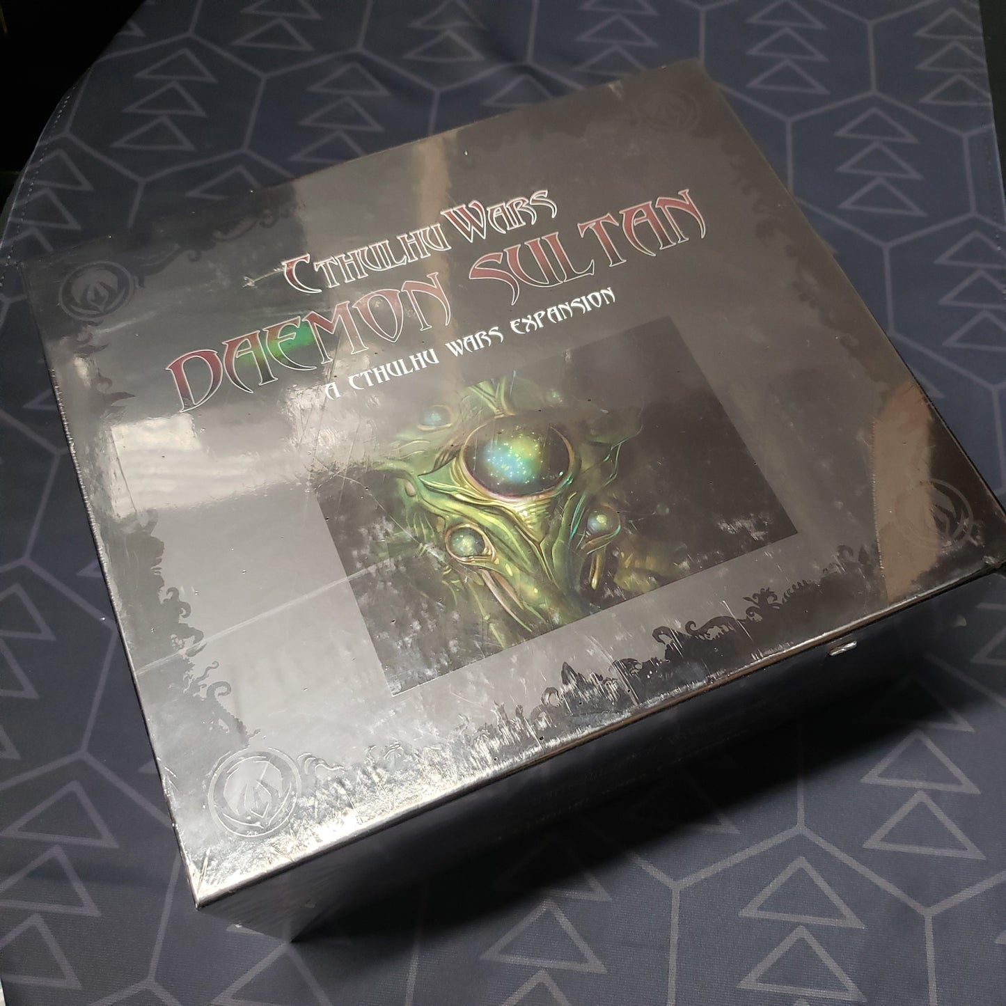 Image shows the front cover of the box of the Daemon Sultan expansion for the board game Cthulhu Wars