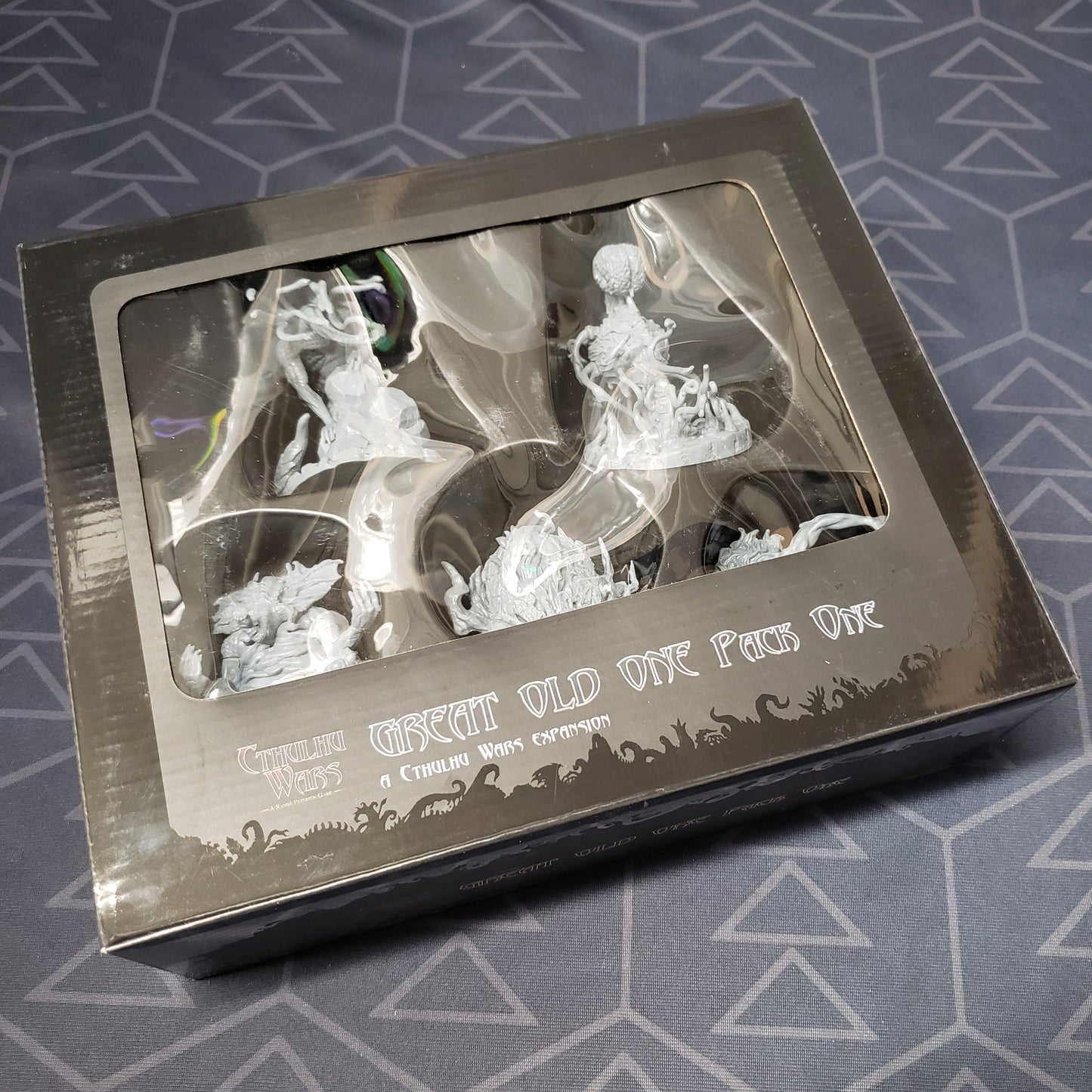 Image shows the front of the packaging for the Great Old One: Pack 1 expansion for the board game Cthulhu Wars