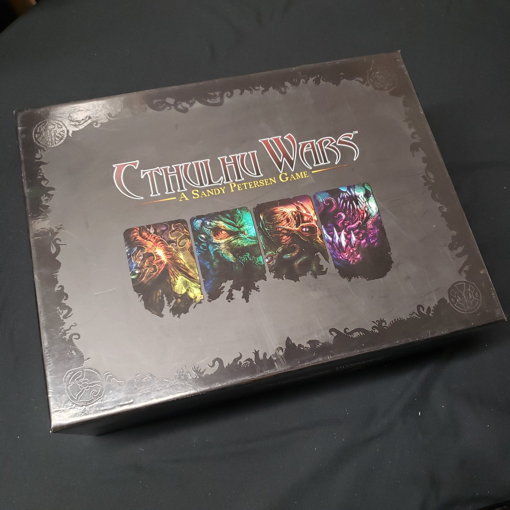 Image shows the front cover of the box for the Cthulhu Wars board game