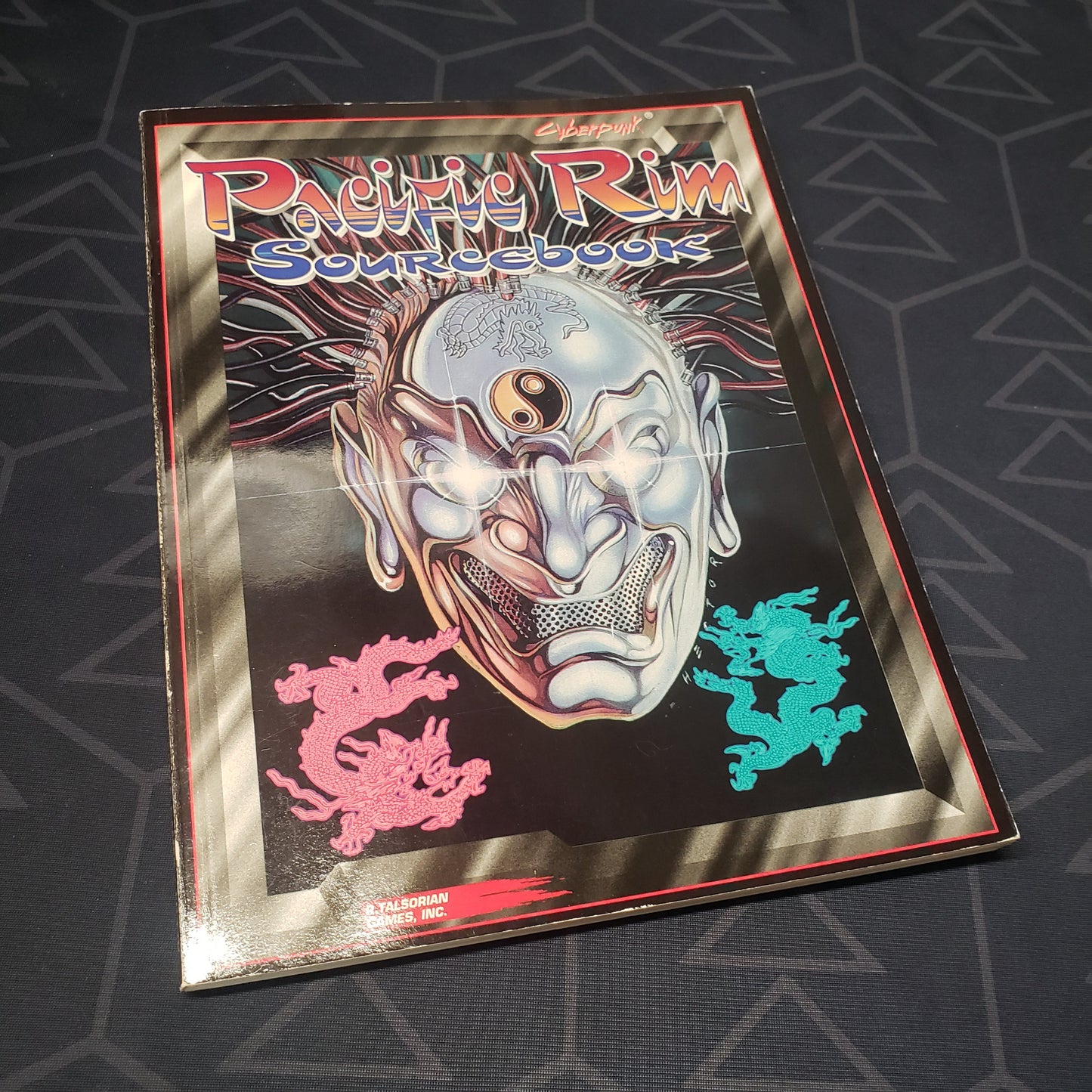 Image shows the front cover of the Pacific Rim Sourcebook for the roleplaying game Cyberpunk 2020