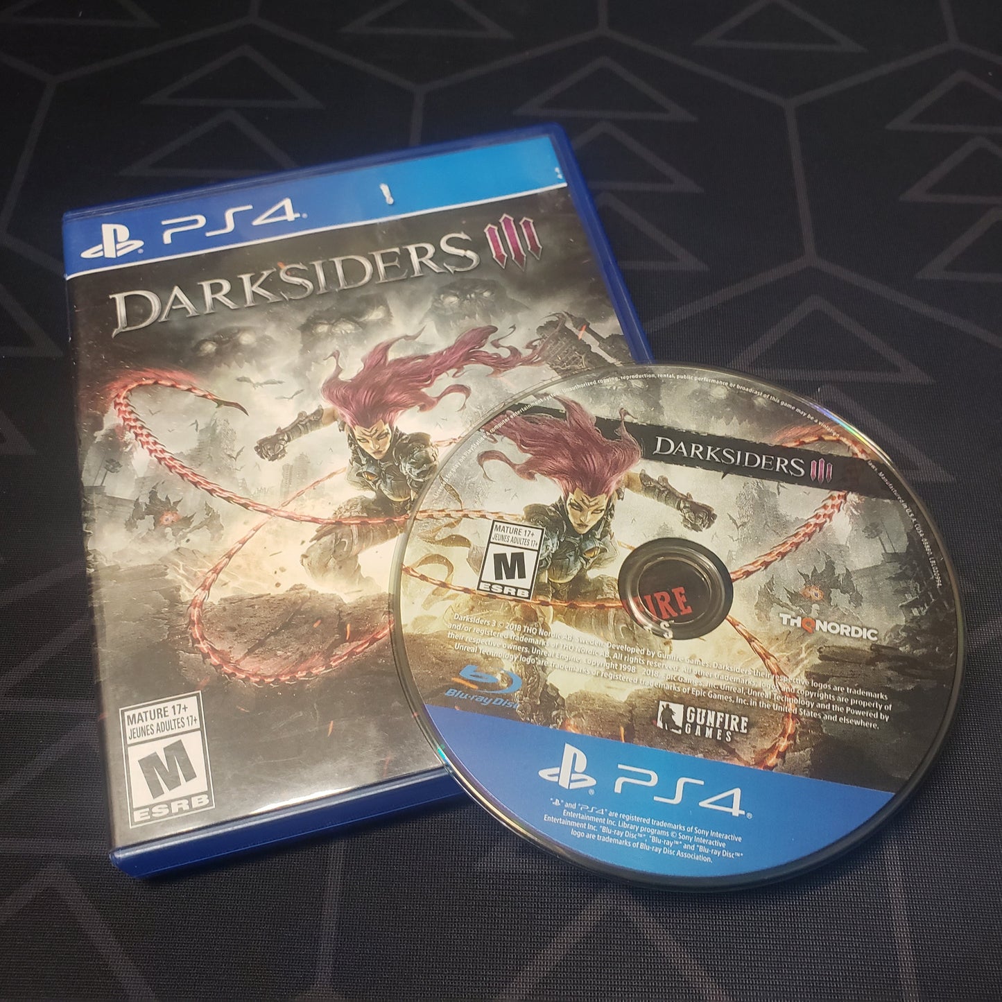 Image shows the case & disc for the video game Darksiders III for Playstation 4