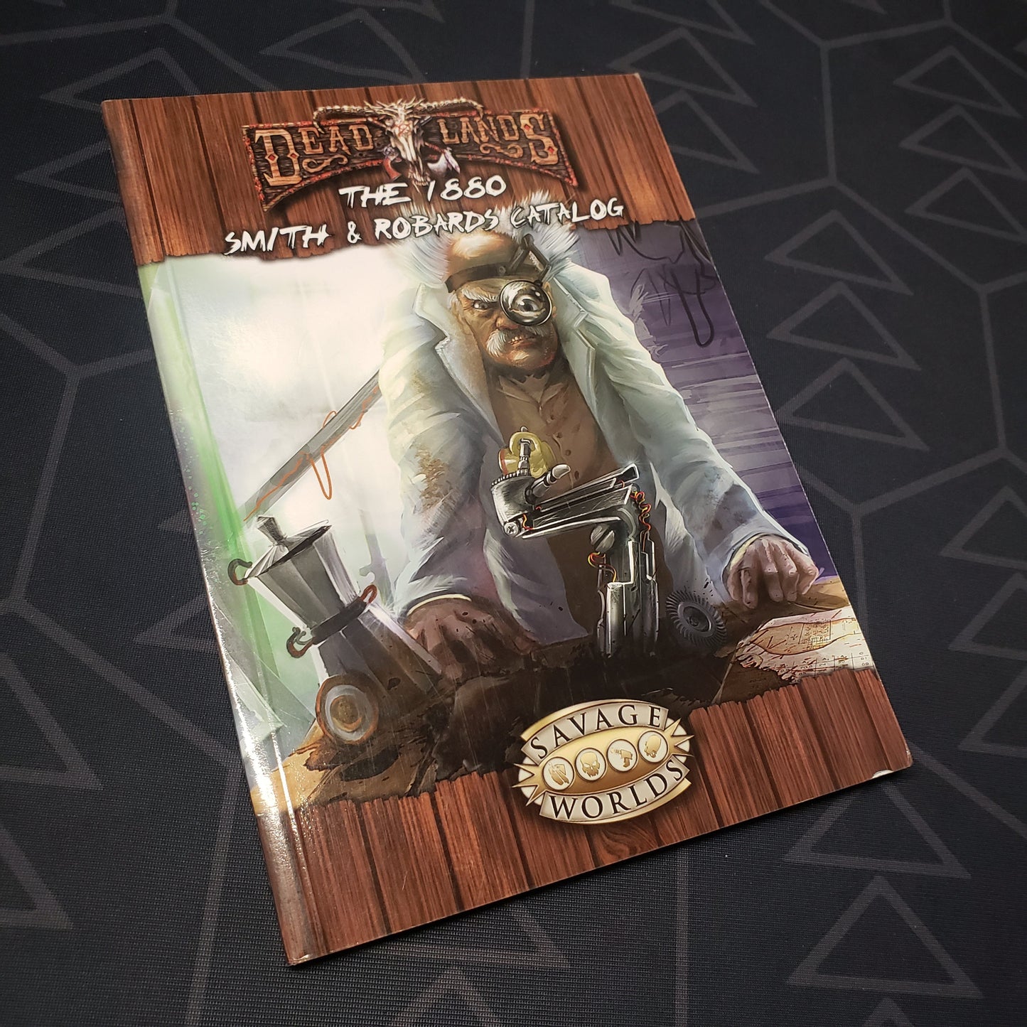 Image shows the front cover of the 1880 Smith & Robards Catalog book for the roleplaying games Deadlands: Reloaded & Savage Worlds