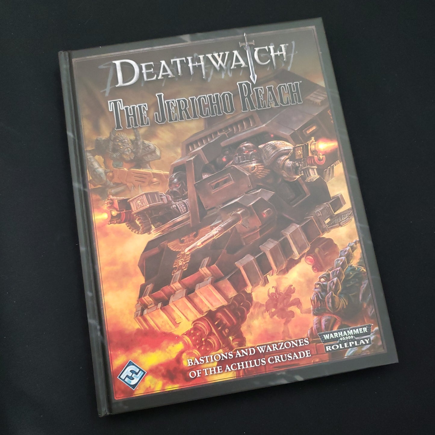 Image shows the front cover of the Jericho Reach book for the Deathwatch roleplaying game