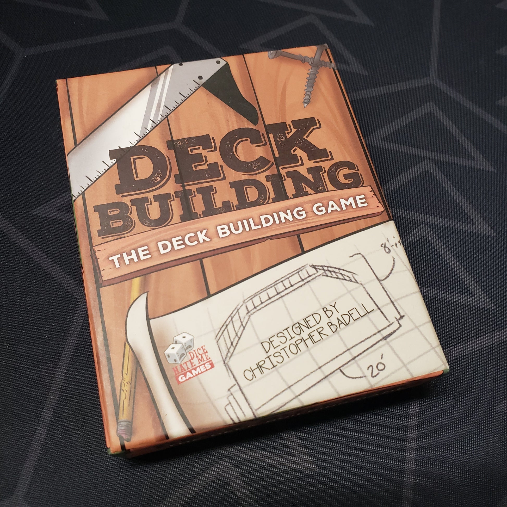 Image shows the front cover of the box for the Deck Building: The Deck Building Game card game