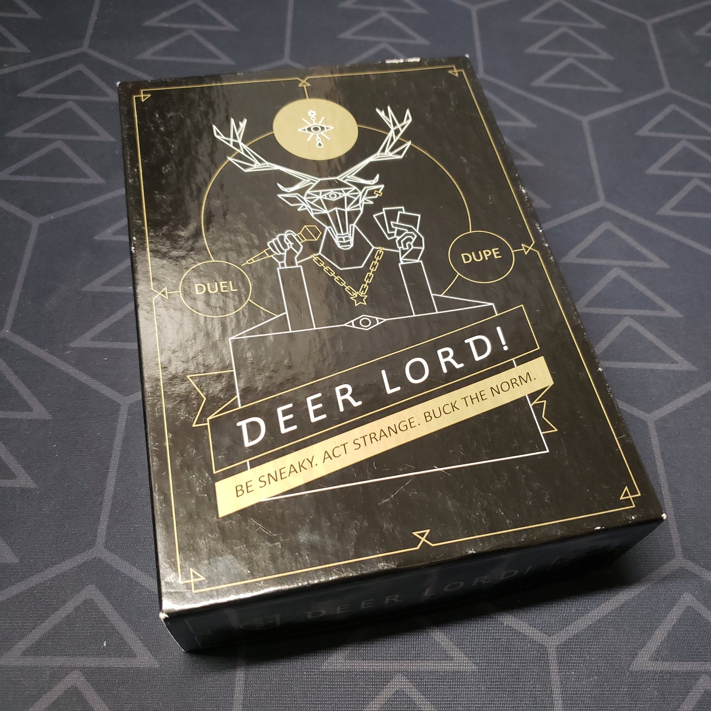 Image shows the front cover of the box for the DEER LORD! card game