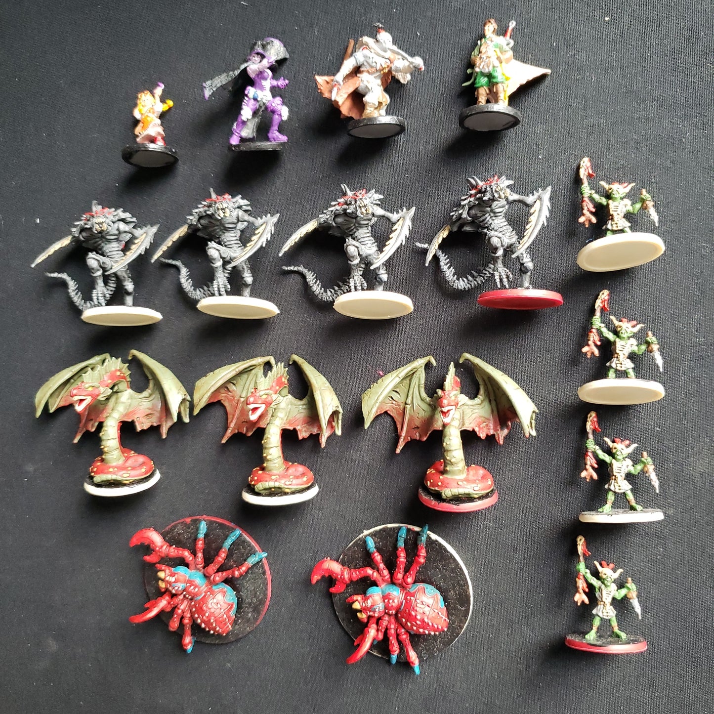Image shows the painted miniatures from the Labyrinth of Ruin expansion for the board game Descent: Journeys in the Dark Second Edition
