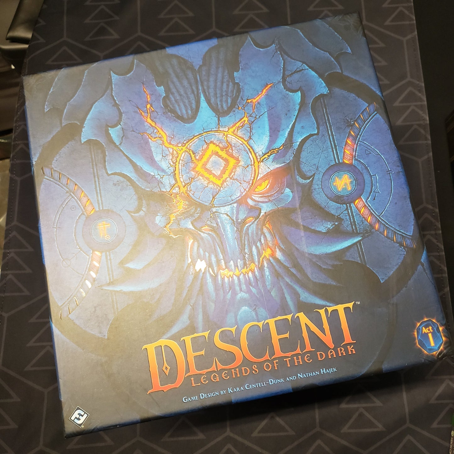 Image shows the front cover of the box of the Descent: Legends of the Dark board game