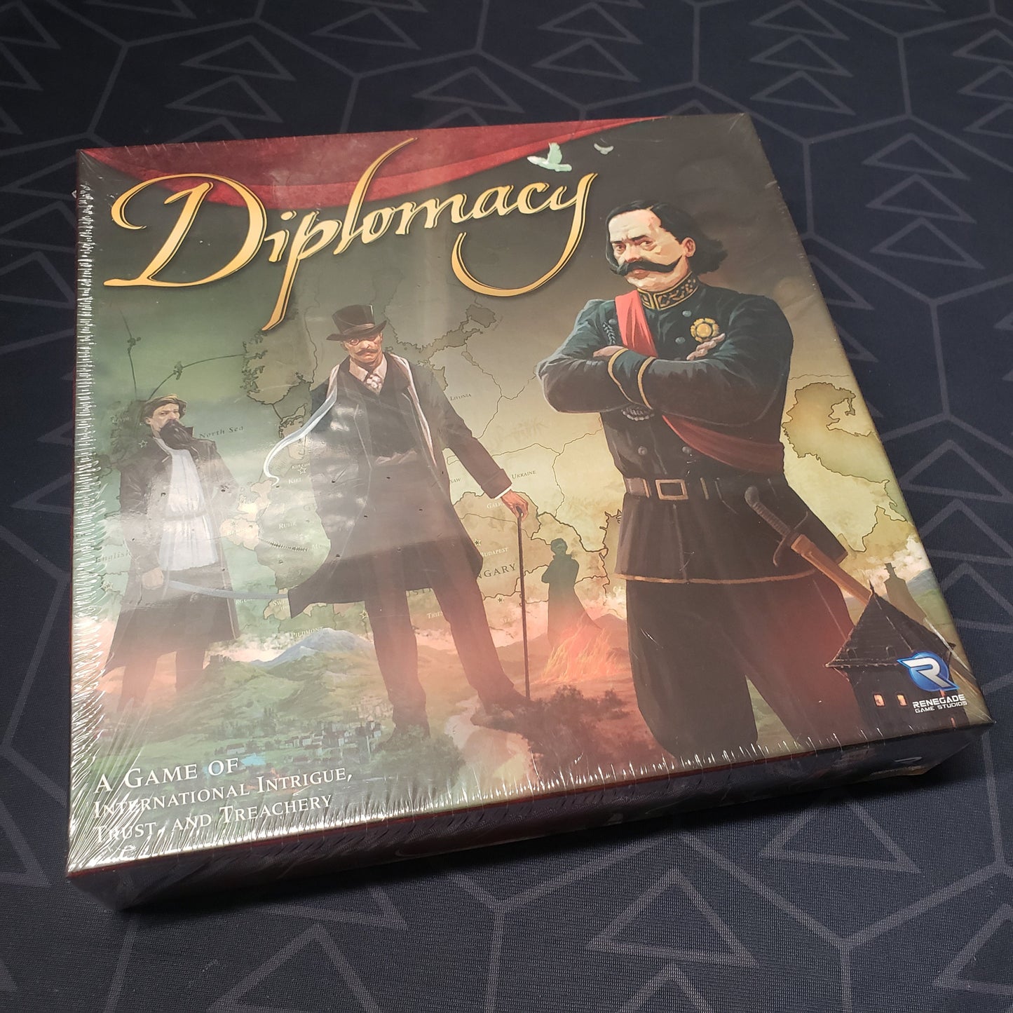 Image shows the front cover of the box for the 2023 Edition of the board game Diplomacy